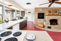 rocky-overlook-kitchen-and-stone-fireplace-1280x720-1