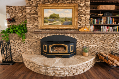 rocky-overlook-living-room-fireplace-and-painting-1280x720-1