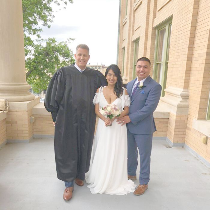 Judge Gravell and a couple he just married at the historic Williamson County Courthouse