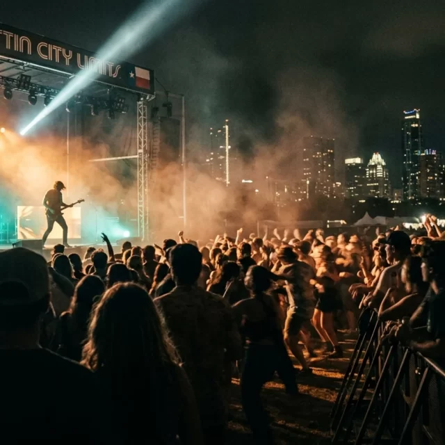 Silhouetted crowd at an Austin live music show, a fun pick among the best things to do in Austin TX