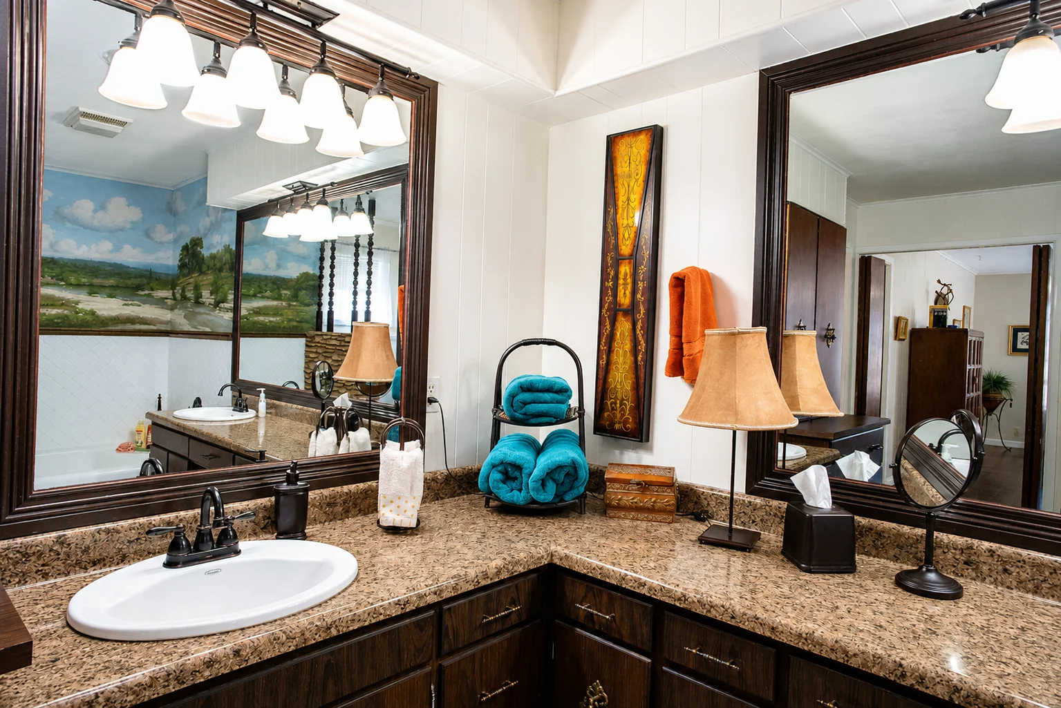 Master bathroom with dual vanities, granite countertops, and elegant fixtures at Scurlock Farms near Georgetown TX